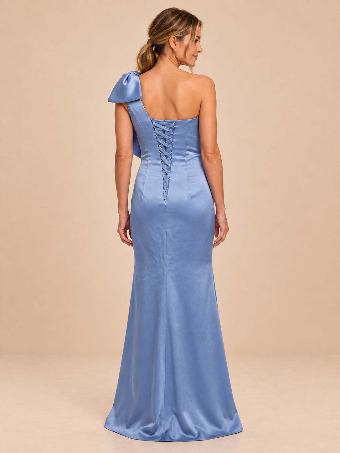 Dusty blue one-shoulder satin dress, back view showing the lace-up design