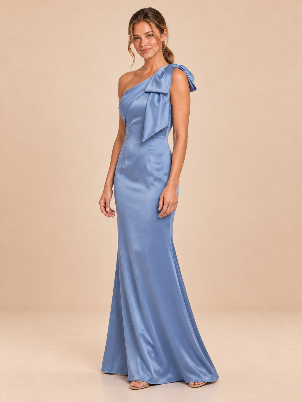 Dusty blue one-shoulder satin dress, three-quarter front view