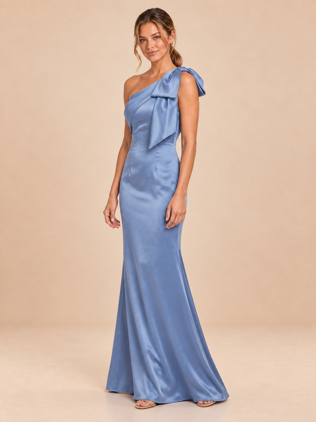Dusty blue one-shoulder satin dress, three-quarter front view