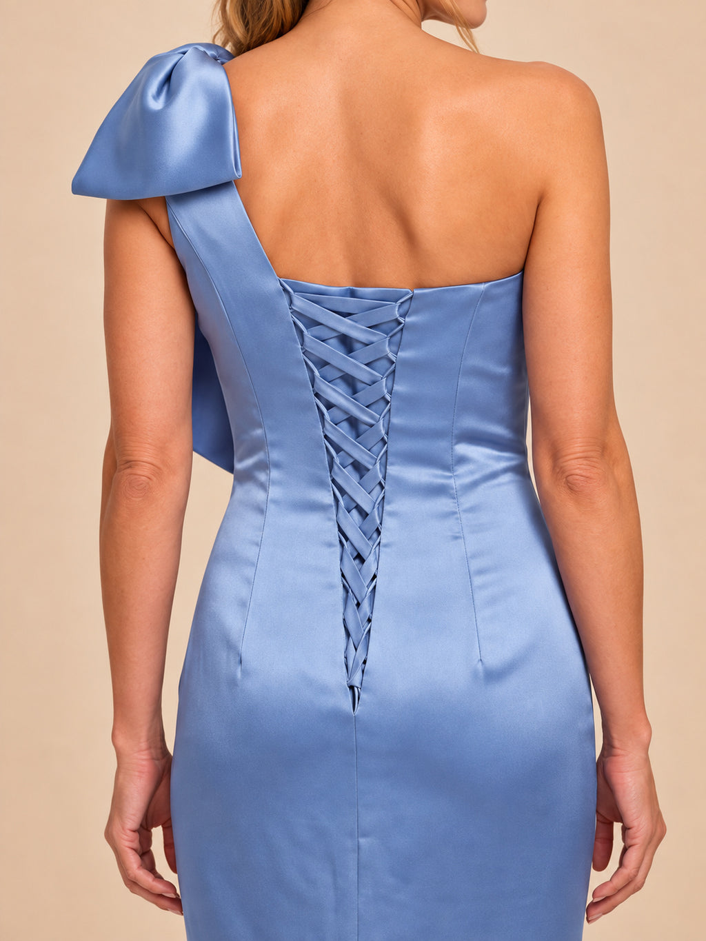 Dusty blue one-shoulder satin dress, close-up of the lace-up back
